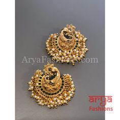 Saba Amrapali Inspired Golden Polki Chandbali Earrings Premium Quality Polki Chandbali Earrings Length: Approx. 2" Light-weight Push-Back closure Gold Finish on high-quality brass as the base metal, Kundan stones and Pearls Suitable for any traditional for contemporary attire and occasion In-stock & ready-to-ship **Color may vary slightly due to photography and lighting. Gold Earrings With Peacock Design For Puja, Traditional Green Pearl Earrings For Festivals, Green Pearl Earrings For Festivals, Peacock Design Earrings For Puja Festivals, Elegant Peacock Design Earrings For Puja, Festival Peacock Design Earrings For Puja, Peacock Design Chandbali Earrings For Puja, Chandbali Peacock Earrings For Puja, Peacock Design Earrings For Festivals