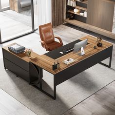 an office desk with a chair and laptop on it