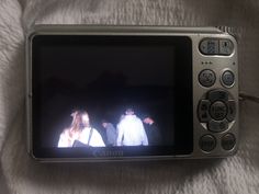 a camera with two people on the screen