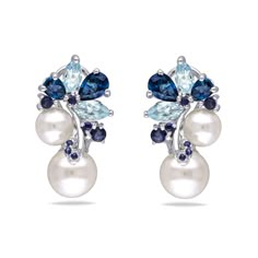 Add a touch of exquisite style to any outfit with the Sterling Silver Pearl, Blue Topaz and Sapphire Cluster Drop Earrings. Crafted from lustrous sterling silver, these earrings feature a cluster design of cultured freshwater pearls, London and Sky Blue topaz and sapphire gemstones for an extra sparkle. Luxury Blue Sterling Silver Pearl Earrings, Luxury Blue Pearl Earrings For Pierced Ears, Pearl Cluster Earrings, Gala Dress, Freshwater Pearl Drop Earrings, Sapphire Earrings, Exquisite Jewelry, Pearl Drop Earrings, Silver Pearls