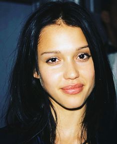 a close up of a person with long hair