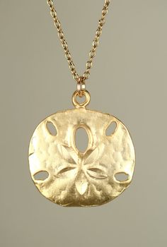 Gold sand dollar necklace delicate necklace a dainty by BubuRuby Minimalist Gold Necklaces For The Beach, Yellow Gold Dangle Necklaces Nickel Free, Elegant Gold Coin Necklace Nickel Free, Dainty Yellow Gold Jewelry For Beach, Delicate Gold Medallion Charm Necklace, Gold Round Jewelry For The Beach, Tarnish Resistant Gold Jewelry For Beach, Delicate Gold Beach Jewelry, Gold Minimalist Necklace For Beach