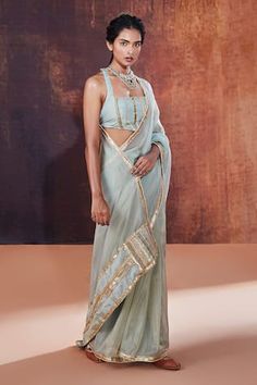 Powder blue saree with cutdana, sequin embroidered border. Paired with halter neck padded blouse. - Aza Fashions Sleeveless Chanderi Pre-draped Saree For Festive Occasions, Powder Blue Saree, Padded Blouse, Border Saree, Embroidered Border, Blue Saree, Silk Embroidery, Saree With Blouse, Powder Blue