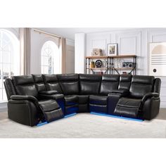 a large sectional couch with recliners in a living room