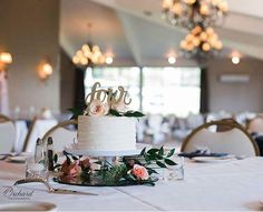 a wedding cake sitting on top of a table