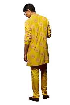 Yellow kurta with floral thread hand embroidery. Paired with a matching plain pant. - Aza Fashions Fitted Pant Set With Resham Embroidery And Straight Kurta, Anarkali Cotton Pant Set With Floral Embroidery, Designer Yellow Lawn Suit With Floral Embroidery, Yellow Cotton Lawn Suit With Floral Embroidery, Spring Cotton Traditional Wear With Gota Work, Spring Traditional Cotton Wear With Gota Work, Straight Kurta Pant Set With Zari Work For Spring, Designer Cotton Pant Set With Resham Embroidery, Designer Embroidered Cotton Pant Set