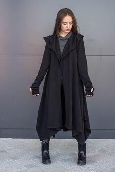 ➤ Features Length: front - 105 cm, back - 120 cm Open front cut cardigan type Long sleeves Bare back Oversized layered hoodie Flared Removable belt Pockets on the sides ● The model is 5'6″ (168cm) tall ● The model is a S ➤ Sizing SIZE CHART (cm/inch) XS-bust 85/33.5, waist 66/26, hips 91/35.8 S-bust 90/35.5, waist 71/28, hips 97/38 M-bust 95/37.4, waist 76/30, hips 102/40 L-bust 102/40, waist 83/32.7, hips 109/43 XL-bust 109/43, waist 90/35.5, hips 116/45.5 2XL-bust 116/45.5, waist 97/38, hips 1 Alternative Black Outerwear With Pockets, Gothic Black Outerwear For Halloween, Black Gothic Outerwear For Halloween, Gothic Black Halloween Outerwear, Black Outerwear For Larp Halloween, Black Emo Outerwear For Fall, Oversized Black Outerwear For Halloween, Gothic Black Outerwear For Larp, Black Emo Outerwear For Alternative Fashion