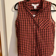 Nwt Sleeveless Checkered Top...Size Small..Color...Black/Red...Buttondown... Pit To Pit 19" Front 23" Long Back 28: Long Cotton/Spandex Blend Casual Denim Vest With Button Closure, Casual Button-up Vest For Work, Casual Plaid Vest For Spring, Casual Sleeveless Vest With Snap Buttons, Casual Cotton Tank Top With Button Closure, Cotton Tank Top With Button Closure For Work, Casual Tank Top With Button Closure, Casual Plaid Sleeveless Vest, Casual Black Tank Top With Button Closure