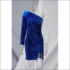 This exquisite Sequin Feather One-Shoulder Chained Up Mini Dress will add a touch of luxury to any special occasion. An eye-catching combination of sequins and feathers make for a truly unique design. The addition of a chain detail along the side and a mini dress silhouette make for a bold and glamorous look. Decoration Sequined , Feathers Length Above Knee, Mini Style Sexy & Club Fabric Type Sequin , Blended fabrics , Mesh Material Polyester , Spandex Neckline One Shoulder Pattern Type Patchwor Blue Feather Trim Dress For Night Out, One Shoulder Party Dress With Feather Trim, Blue One Shoulder Dress For Prom Cocktail, Blue One Shoulder Party Dress, Glamorous Blue Sequin Party Dress, Blue One Shoulder Dress For Prom Party, Blue One-shoulder Dress For Prom Party, Blue One-shoulder Dress For Prom Season Party, Glamorous Blue One Shoulder Evening Dress