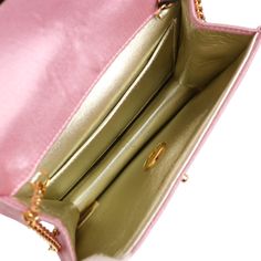 This Vintage mini flap bag is in Pink satin with gold hardware, featuring a single straight front flap with signature CC logo turnlock, a rear slip pocket, and a gold chain link shoulder/crossbody strap.The interior is lined in gold leather and includes one slip pocket on the back wall. Collection: 2-series (1991-1994) Origin: FranceCondition: Vintage; Excellent - This bag retains its shape and structure. There are some signs of wear to the exterior, including dirt marks, light staining, and mod Gold Crossbody Shoulder Bag With Cc Turnlock Closure, Gold Flap Bag With Cc Turnlock For Everyday, Gold Shoulder Bag With Cc Turnlock For Evening, Gold Double Flap Evening Bag, Gold Shoulder Bag With Cc Turnlock Closure For Evening, Elegant Gold Flap Bag With Turn-lock Closure, Gold Double Flap Shoulder Bag For Evening, Gold Double Flap Shoulder Bag For Formal Occasions, Gold Double Flap Evening Shoulder Bag