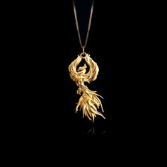 Elevate your style with our 14k Gold Phoenix Pendant, a symbol of rebirth and beauty. This solid gold Phoenix necklace captures mythological charm. Explore our collection of Phoenix-themed jewelry, including elegant gold medallions, perfect for those seeking a unique and meaningful piece inspired by the Phoenix's symbolism. PENDANT INFORMATIONThis pendant is made of real, solid gold.• Made in USA• Material: 14k or 18k solid gold• Finish: polished• Height: 1.5" (38,5 mm) | *includes the small circle, bail dimensions not included• Width: 0.85" (21,5 mm)• Pendant weight: approx. 6 grams (14k)• Bail: fits up to 4 mm chains• Solid back, not hollow• A certificate of authenticity is included• Delivered in our elegant jewelry box, making it the perfect gift Shipping: All of our orders are custom-m