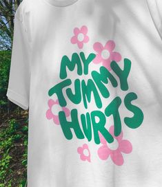 My Tummy Hurts Aesthetic Tee Shirt | Groovy Graphic Tee | Trendy Y2K | Tumblr Graphic Tee | Celiac, Gluten-free, IBS, Lactose, Green Pink If you love super soft and extremely comfy shirts then you will absolutely love this Bella + Canvas unisex shirt! * This is a Unisex style tee, although it is looser and longer than an average women's tee it mostly true to size. For that oversized look please order a few sizes up! If you prefer a fitted look typically we suggest ordering your normal size or one size down if you like it snug. * Solid Colors: 4.2 oz., 100% airlume combed and ringspun cotton * Heather Colors: 4.2 oz., 52/48 Airlume combed and ringspun cotton/polyester * Heather Prism Colors: 99/1 airlume combed and ringspun cotton/ polyester (Unique coloring, grey flecks of heather pulled t Graphic Tee Ideas Prints, Shirt With Words Aesthetic, Graphic Tees Women Fashion, Prints For Shirts Graphic Tees, Celiac Aesthetic, Groovy Graphic Tee, Painted T Shirts Aesthetic, Prints On T Shirts, T Shirt Prints Ideas Graphic Tees