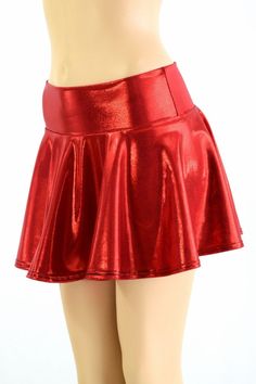 "This item is made to order, please read all the way through the listing before purchasing! This mini skirt is made from a brilliantly bold red metallic spandex. It is made of four way stretch lycra spandex. It has a soft, spandex waistband (elastic free) that sets at the natural waist. Womens Sizing (See below for instructions on where measurements should be taken) XXS: Bust 29\"-30\" / Waist 22\"-23\" / Hips 30\"-32\" Extra Small: Bust 31\"-32\" / Waist 24\"-25\" / Hips 33\"-35\" Small: Bust 3 Stretch Club Skort In Solid Color, Stretch Solid Color Skort For Club, Stretch Skort For Clubbing, Solid Shiny Party Bottoms, Shiny Solid Color Party Bottoms, Solid Shiny Bottoms For Party, Shiny Stretch Mini Skirt, Shiny Solid Color Bottoms For Party, Stretch Metallic Mini Skirt For Party