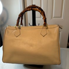 Excellent Used Condition Leather Bamboo Handles Bamboo Zipper Pull 13”L X 5”W X 8”H This Is A Preloved Bag, Please Look At All Pictures Classic Gucci Bag With Bamboo Handle, Gucci Beige Satchel For Shopping, Beige Gucci Satchel For Shopping, Luxury Formal Satchel With Bamboo Handle, Gucci Beige Rectangular Satchel, Formal Beige Bag With Bamboo Handle, Formal Beige Shoulder Bag With Bamboo Handle, Elegant Beige Gucci Satchel, Classic Beige Bags With Bamboo Handle