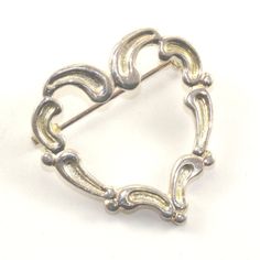 This is Vintage PD Premium Design Heart Shape Scroll Design Pin/Brooch Condition: Vintage Metal: Sterling (.925) Silver Weight: 5.3 grams Size: 1.25 in Images you see are actual pictures of jewelry you will receive Every purchase comes thoughtfully packaged and ships within 1 business day New York State buyer will be charged sales tax Feel free to contact us with any questions. We are open Mon-Fri 9-5 EST We appreciate your business Silver Brooches For Anniversary On Valentine's Day, Vintage Silver Brooches For Valentine's Day, Scroll Design, Sales Tax, New York State, Premium Design, Pin Brooch, Heart Shape, Infinity Bracelet