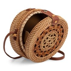 PRICES MAY VARY. Handmade With Premium Rattan : This rattan purse is handmade with carefully chosen 100% natural rattan that has been carefully woven to create a beautiful, sturdy, and long-lasting round purse straw bag for women. Our wicker purses for women are perfect for carrying your essentials in a stylish and sophisticated way. Tight Weave For Long-Lasting Use : The weave on this wicker purse rattan crossbody bags for women is some of the highest quality available, and with proper care, yo Eco-friendly Brown Crochet Bag With Woven Leather, Brown Rattan Straw Bag With Woven Leather, Brown Rattan Straw Bag With Woven Leather Details, Brown Woven Rattan Crochet Bag, Bohemian Brown Straw Bag With Woven Leather, Handwoven Brown Rattan Crochet Bag, Brown Bohemian Straw Bag With Woven Leather, Brown Handwoven Rattan Crochet Bag, Brown Handwoven Crochet Rattan Bag