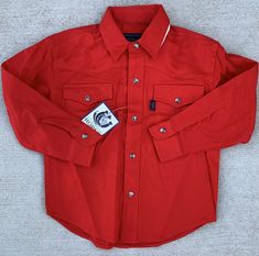 Roper western shirt kids XS 4-5 snap closure cowboy code collection cowgirl rodeo red. Condition is new with tags. 100% cotton. NOT a stretchy fabric. Kids (children’s) size XS 4-5 See pics 10, 11 and 12 for laying flat measurements. Could be worn by anyone (depending on your style) if the measurements work for you. Snap front, snap chest pockets and snap sleeves. All pics are of the same one shirt buyer will receive. See all 12 pics for details & enlarge each pic for a closer look. Any wear, im Cowboy Code, Cowgirl Rodeo, Western Shirt, Western Shirts, Work For You, Stretchy Fabric, Rodeo, Snap Closure, Cowboy