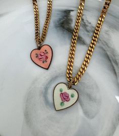 🌹 Vintage heart each uniquely hand painted with a pink rose in the center. Strung on a deep, gold tone rounded box chain. 💖 Add a vintage, rose quartz candy heart to complete the charm necklace look! These mini glass hearts were made in Japan in the 1950s/1960s. ✦ Check out nctrnlcollection.com! ✦ Follow @_nctrnlofficial on Instagram for promos and early releases! ✴ JEWELRY CARE ✴ * Avoid contact with water, perfume, or chemicals. * Take jewelry off before showering, exercising, cleaning, etc. Retro Charm Necklace For Gift, Retro Charms Necklace For Gift, Retro Charms Necklace Gift, Vintage Pink Necklaces For Valentine's Day, Vintage Pink Necklace For Valentine's Day, Vintage Personalized Heart Necklace, Retro Heart-shaped Necklace For Gift, Retro Heart-shaped Necklace Gift, Vintage Pink Heart Necklaces