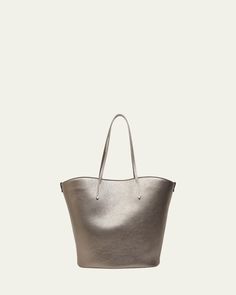 Brunello Cucinelli tote bag in metallic leather     Shoulder straps     Open top     Approx. 20.9"H x 12.2"W x 7.1"D    Made in Italy Luxury Silver Leather Bucket Bag, Luxury Metallic Shoulder Bag For Daily Use, Elegant Bucket Bag With Double Handle And Palladium Hardware, Chic Silver Leather Bucket Bag, Luxury Metallic Shoulder Bag For Shopping, Luxury Metallic Bags For Shopping, Luxury Metallic Shopping Bags, Elegant Metallic Shoulder Bag For Travel, Elegant Metallic Travel Bag