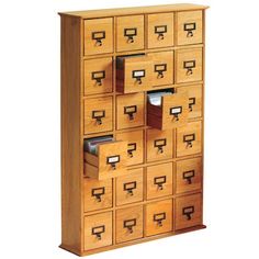 a large wooden cabinet with many drawers