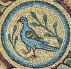 a blue bird sitting on top of a mosaic floor