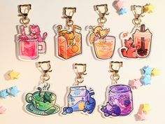 six different key chains with cartoon images on them