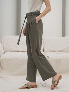 - Simple and modern design- Straight and trendy fit- D belt on waist- Point of pintuck Measurement(S/ M/ L)- Waist: 26.7/ 28.7/ 31.2in.- Hip: 37/ 38.9/ 40.9in.- Length: 40.1/ 40.3/ 40.5in.- Model height: 5.7ft.- Model chest: 31.1in.- Model waist: 24.4in.- Model hips: 33.8in.Composition- 80% Tencel, 16% Rayon, 4% Span- Dry CleaningDesigner- Imported- By RE RHEE- Style#:300875519 Elegant Belted Solid Wide Leg Pants, Elegant Solid Color Belted Wide Leg Pants, Casual Workwear Pants With Belt, Chic Belted Wide Leg Workwear Pants, Belted Bottoms For Office In Spring, Chic Wide Leg Pants With Belt For Work, Belted Bottoms For Spring Office Wear, Spring Office Wear: Belted Bottoms, Spring Office Belted Bottoms