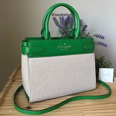 100% Authentic Kate Spade Staci Canvas Medium Satchel Green Multi And Silver Hardware Brand New With Tags 10.5” (Width) X 8.5” (Height) X 5” (Depth). Medium Size Handles Are 5” Drop Long Shoulder Strap Included Elegant Spring Bag With Leather Trim, Elegant Bags With Leather Trim For Spring, Elegant Textured Leather Bags For Spring, Elegant Green Bags With Leather Trim, Kate Spade Purse Pink, Kate Spade Staci, Kate Spade Purse Black, Kate Spade Satchel, Bags Kate Spade