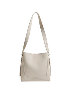 a white handbag on a white background with straps around the bottom and side pocket