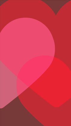 a red and pink heart on a brown background