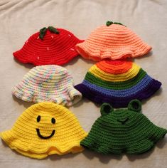 A crocheted bucket hat with many different styles! You can pick from frog, peach, rainbow, strawberry, funfetti, or a smiley face! These hats come in adult and child sizes, and make the perfect gift for friends and family, as well as yourself. Snag yours today! Cute Cotton Bucket Hat, Colorful Crochet Casual Hats, Playful Adjustable Orange Hat, Playful Multicolor Brimmed Sun Hat, Cute Crochet Mini Beanie Hat, Cute Crochet Beanie Mini Hat, Pink Adjustable Crochet Hat In Playful Style, Colorful Fun Hat, One Size Fits Most, Pink Crochet Hat, Fun Style