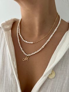 Half gold filled link, half freshwater pearl 16 inches with 2 inch chain extender Gold Pearl Pendant Necklace In 14k Gold Filled, Everyday Pearl Charm Necklace With Pearl Chain, Everyday Pearl Chain Charm Necklace, Everyday 14k Gold Filled Necklaces With Pearl Charm, Dainty Double Strand Necklace With Pearl Charm, Everyday 14k Gold-filled Pearl Drop Necklace, Elegant Jewelry With Baroque Pearl And Paperclip Chain, Everyday White 14k Gold-filled Pearl Necklace, Everyday White 14k Gold Filled Pearl Necklace