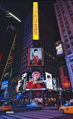 the times square in new york city is lit up with neon signs and billboards