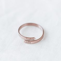 Personalize your own ring with two names! Our Engraved Name Ring has been incredibly popular this holiday season for its unique look and customization! It goes with just about any outfit and is perfect for any occasion! Get your loved one a gift worth Remembering. Available in Gold, Rose Gold and Silver Nickel and lead free Not available in stores Fully hand made Gold and Rose Gold Material: 18K Gold-Plated Silver Material: Stainless Steel Personalized Rose Gold Engraved Ring For Promise, Personalized Engraved Rose Gold Promise Ring, Personalized Rose Gold Engraved Promise Ring, Personalized Rose Gold Engraved Ring For Gift, Personalized Engraved Rose Gold Ring For Gift, Personalized Rose Gold Rings For Valentine's Day, Rose Gold Engraved Name Ring As Gift, Rose Gold Engraved Ring With Name For Gift, Rose Gold Engraved Name Ring For Gift