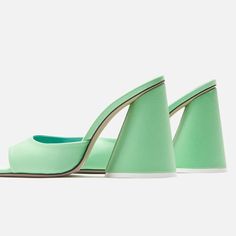 As With Any Footwear From The Attico, The Luz Mules Make A Glamorous Statement. Made From Mint Green Satin With Rounded Toes, They Are Defined By Signature Conical Block Heels. Comes With A Box Lining: Leather Made In Italy Sole: Leather Insole And Sole Toe Shape: Square Open Toe Upper: Fabric Tiny Imperfection On Inside Of One Show. See Pic, Barely Noticeable. Spring Gala Heels With Sculpted Heel, Green Heels With Deep Heel Cup For Summer, Green Open Heel Evening Heels, Spring Cocktail Heels With Sculpted Heel, Spring Cocktail Heels With Reinforced Heel, Modern Sandals For Spring Gala, Chic Green Heels For Cocktail, Green Pointed Toe Heels For Cocktail, Modern Green Open Heel Heels