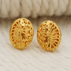 Please click -- Learn more about this item -- below for a full description 22k gold earrings handmade jewelry made in India weight is 4.55 grams approx. length is 1.4 centimeter approx. width is 1.1 centimeter approx. please message me if you want real gold screw/backs. Elegant Yellow Gold Earrings For Puja, Gold Plated Round Earrings For Puja, Gold Round Earrings For Puja, 22k Gold Earrings For Diwali Anniversary, Yellow 22k Gold Earrings For Anniversary, 22k Yellow Gold Earrings For Diwali, 22k Gold Hallmarked Earrings For Puja, Yellow Gold Earrings As Diwali Gift, 22k Yellow Gold Earrings For Festive Occasions