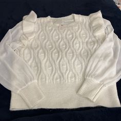 Cozy And Dressy At The Same Time. White Cable Knit Anthropologie Sweater With Beautiful Sheer Sleeves White Long Sleeve Acrylic Top, Chic Knitted Acrylic Tops, White Textured Knit Top, Chic Acrylic Crew Neck Sweater, White Textured Knit Acrylic Tops, Chic Acrylic Knitted Tops, White Fine Knit Top For Winter, Chic White Acrylic Sweater, White Cable Knit Acrylic Top