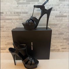 Saint Laurent 105 Mm Tribute Platform Sandals Size 39 Color Black High Heel Stiletto Sandals With Intertwining Straps Made With Metal-Free Tanned Leather, Featuring A Beveled Platform, Covered Heel And Adjustable Ankle Strap Engraved With Saint Laurent Paris. Two Heel Heights Available. 100% Calfskin Leather Chrome Free And Metal Free Tanned Leather Total Heel Height: 13,5 Cm / 5.3 Inches Arch Height: 10,5 Cm / 4.1 Inches Platform Height: 3 Cm / 1.2 Inches Leather Sole Adjustable Ankle Strap Sty Designer Evening Sandals With 4-inch Heel, Designer Formal Sandals With 4-inch Heel, High Heel Platform Sandals For Cocktail Occasions, High Heel Platform Sandals For Cocktail, Designer Sandals With 4-inch Heel For Gala, Luxury Platform Sandals With Open Heel, Luxury Open Heel Platform Sandals, Elegant Platform Sandals With Pointed Toe, Luxury Heels With Heel Strap And Closed Toe