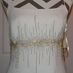 Feel Like A Goddess In This Stunning Marie St. Clair Gown, Dress, Perfect For Weddings, Parties, And Formal Events. The Sleeveless, Strappy Sleeve Design Adds A Touch Of Summer And Spring To This Glamorous Dress, While The Elegant Gold Beading Accents Create A Subtle, Metal Look. This Ivory, Long Dress Has A Back Zip Closure Is A Size 4 And Has A Bodycon Style. Dress Is Fully Lined. Dress To Impress With This Gorgeous Piece. Retail Price $225.00, A Steal For You At $99.00. Extra Beads Attached T Glamorous Dress, St Claire, Bodycon Style, Glamorous Dresses, A Goddess, Bodycon Fashion, Gown Dress, Cream And Gold, Sleeve Designs