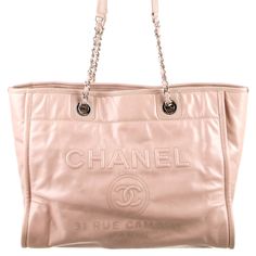 Chanel Deauville Tote From Spring Summer Collection 2016 Pink Calfskin, Extremely Soft Silver Tone Hardware Dual Shoulder Straps Exterior Pocket Canvas Lining, 3 Interior Pockets Snap Closure, Protective Feet On Base 10.5 Height 16.5 Width 5.25 Depth Shoulder Strap Drop, 9.5 I Purchased This From The Real Real , Never Used It, Kept In Dust Bag. Beautiful Condition, The Leather Is Super Soft And Subtle, There Are Creases In Leather, No Rips, Hole, Inside Is Very Clean, Looks To Have Been Barely U Designer Leather Bags With Lined Interior, Luxury Rectangular Bag With Lined Interior, Designer Tote Bag With Lined Interior, Luxury Tote Bag With Lined Interior, Leather Top Handle Bag With Lined Interior, Luxury Shopping Bags With Lined Interior, Designer Travel Bag With Lined Interior, Luxury Shopping Bag With Lined Interior, Luxury Shoulder Bag With Lined Interior For Shopping