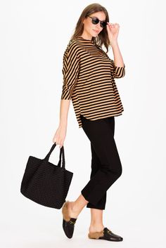 Meet the Betsy! This will be your go-to top all season long. Made from the softest and stretchiest fabric, this relaxed-fit top makes dressing a breeze! Pair it with our traveling pants for the perfect fall outfit! FEEL: (45% Rayon 50% polyester 5% spandex) This sumptuously soft Fall Stripe is crafted for comfort and style. This fabric boasts a timeless stripe pattern that not only feels incredibly soft but also exudes a classic charm perfect for the fall season. FAVORITE FEATURES: Raw hems Soft Casual Relaxed Fit Knit Top For Fall, Casual Stretch Blouse For Fall, Versatile Stretch Knit Top For Day Out, Versatile Relaxed Fit Knit Top For Fall, Versatile Long Sleeve Knit Top, Versatile Fall Loungewear Tops, Chic Textured Knit Blouse For Fall, Versatile Tops For Fall Loungewear, Casual Stretch Blouse For Day Out