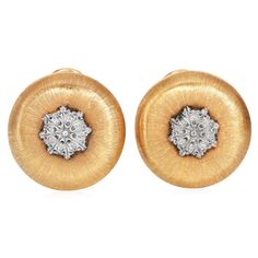 This Vintage collectible  Buccellati earring is made in 18k yellow and white gold. With famous Buccellati's signature Rigato finish. It is a testament to the brand's dedication to naturalistic beauty. Earrings Measure 22mm wide.  Signed Buccellati, Italy, 18k. Total Weight: 15.8 grams Condition: Excellent In Excellent Condition Luxury Round Clip-on Diamond Earrings, Luxury Screw Back Earrings For Formal Occasions, Yellow Gold Round Diamond Clip-on Earrings, Luxury Yellow Gold Screw Back Earrings, Luxury Yellow Gold Earrings With Screw Back, Luxury Yellow Gold Clip-on Diamond Earrings, Exquisite Yellow Gold Clip-on Earrings, Buccellati Earrings, Vintage Cocktail Ring