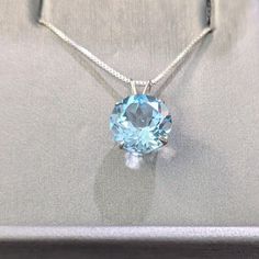 14k White Gold 4.10 ctw Aquamarine Pendant This large aquamarine pendant is 4.10 ctw and 10mm in diameter. It is a beautiful faceted gem that sparkles in the sun and any other light! There are no inclusions or flaws seen. The 14k white gold setting is marked on the back. Aquamarine Pendant, Aquamarine, Pendant Necklaces, Jewelry Necklace Pendant, The Sun, Beauty Book, Accessory Gift, Sparkle, Jewelry Necklaces