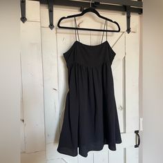 Shein Spaghetti Strap Babydoll Black Mini Dress With Pockets. Size Large. Never Worn, Brand New! Spring Black Suspender Dress For The Beach, Black Suspender Dress With Spaghetti Straps For The Beach, Black Suspender Dress With Spaghetti Straps For Summer, Black Mini Suspender Dress With Adjustable Straps, Black Sundress Suspender Dress For Beach, Black Sundress With Spaghetti Straps, Black Spaghetti Strap Sundress, Black Beach Sundress With Suspenders, Black Mini Dress With Adjustable Spaghetti Straps