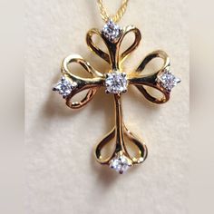 Moissanite Fire .37ctw Diamond Equivalent Weight Round, 14k Yellow Gold Over Sterling Sliver Cross Pendant With 18 Inch Rope Chain. Measures 1 & 1/16" L X 13/16" W. Actual Moissanite Weight Is .31ctw. New In Box. Selling Late Mother-N-Law's Items. Feel Free To Make Offers Anniversary Diamond Cross Necklace With Accents, Anniversary Cross Diamond Necklace With Accents, Diamond White Cross Jewelry For Anniversary, Anniversary Jewelry With Diamond Accents On Cross Pendant, Sterling Silver Cross Pendant Diamond Necklace For Anniversary, Diamond Accented Cross Pendant Jewelry For Anniversary, Diamond Accented Cross Pendant For Anniversary, Yellow Gold Moissanite Jewelry Gift, 14k Gold Cross Diamond Necklace For Anniversary