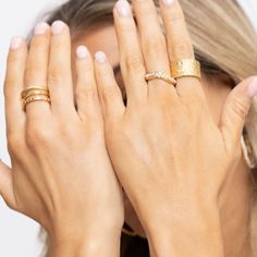 Elevate your look with the Catalina Pearl Ring! This playful and whimsical ring boasts a charming hammered design and a stunning pearl at its center. Perfect for any occasion, it's sure to capture attention and evoke joy. Brazilian Gold Filled Hypoallergenic Water & Tarnish Resistant Elegant Hammered Midi Rings For Wedding, Delicate Hammered Rings As A Gift, Delicate Hammered Rings For Gifts, Delicate Hammered Rings Gift, Delicate Hammered Ring Jewelry, Delicate Hammered Jewelry Ring, Gift Stackable Hammered Rings, Fine Jewelry Open Ring With Hammered Detail, Fine Jewelry Hammered Open Ring