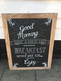 a chalkboard sign that reads good morning have a great breakfast served until 11 30pm