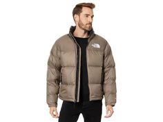 The North Face 1996 Nuptse Jacket - Men's Coat : Falcon Brown : Please note, the logo and hardware color may vary in styles marked as Prior Season. The North Face 1996 Nuptse Jacket has a classic look with modern tech that'll keep your rocking no matter where you're adventures take you! Standard fit is eased, but not sloppy, and perfect for any activity. Stows into its own hand pocket. DWR Coating: Durable Water Repellent coating that sheds light rain and dries quickly to keep you comfortable wh Casual The North Face Puffer Jacket For Outdoor, Casual The North Face Puffer Jacket For Hiking, Durable Casual Outerwear For Streetwear, Casual Durable Outerwear For Streetwear, North Face Puffer Men, Brown North Face Puffer, North Face 1996 Nuptse, 1996 Nuptse Jacket, Mens North Face