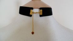 It has a beautiful black and red Rose pendant.The rose pendant is 1 1/2"(4 cm) in length. The velvet is approximately 1" ( 2 1/2 cm) wide and on the back of the choker you have an extra 2 1/2" ( 6 cm) by means of a gold plated extender chain,which fastens with a gold plated clasp.Combined shipping on multiple items.PLEASE NOTE: International buyers who pay for Airmail only will NOT get a tracking number as this facility is only available for "International Tracked" Cameo Choker Necklace, Cameo Choker, Medieval Necklace, Rose Choker, Medieval Wedding, Choker Black, Gothic Chokers, Beautiful Chokers, Black Velvet Choker