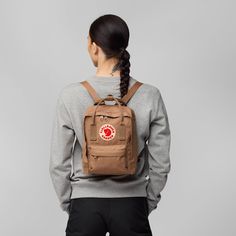 Behold the Fjällräven Kånken Mini: a tiny titan of style and convenience that's ready to revolutionize your everyday carry game! Picture this mini marvel as your trusty sidekick, always by your side as you navigate the bustling city streets or wander through tranquil nature trails. With its charming design and extremely practical features, the Kånken Mini is more than just a bag – it's a statement piece that adds a touch of whimsy to your daily adventures.Step into the world of fun and functionality with the Fjällräven Kånken Mini – the little bag with big personality! From its compact size to its durable construction, every aspect of this mini masterpiece is designed to make your life easier and your style brighter. Whether you're running errands around town or exploring the great outdoor Whats In My Fjallraven Backpack, Fjallraven Kanken Backpack Fog Pink, Fjallraven Kanken No 2 Laptop 15, Converse Backpack Inside, Fjallraven Kanken Mini, Trekking Jacket, Save The Arctic, Hunting Backpacks, Popular Backpacks